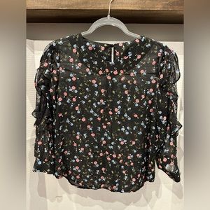 Round neck sheer blouse with ruffle and lace details